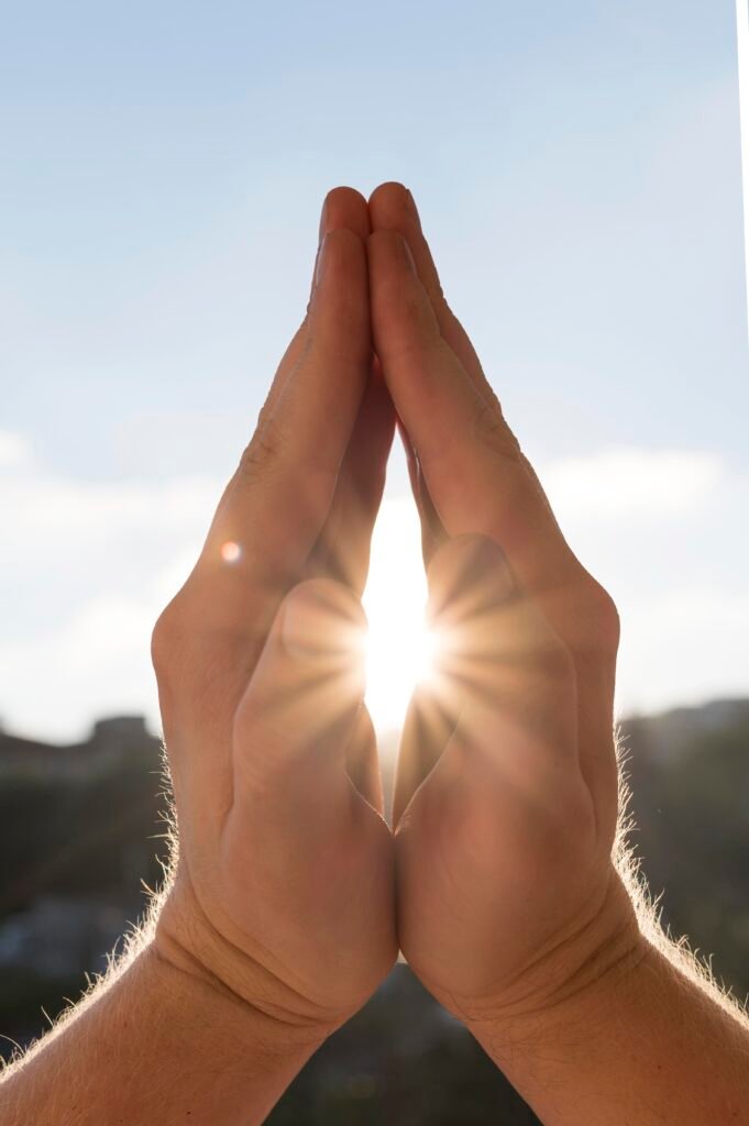 front view hands prayer stance