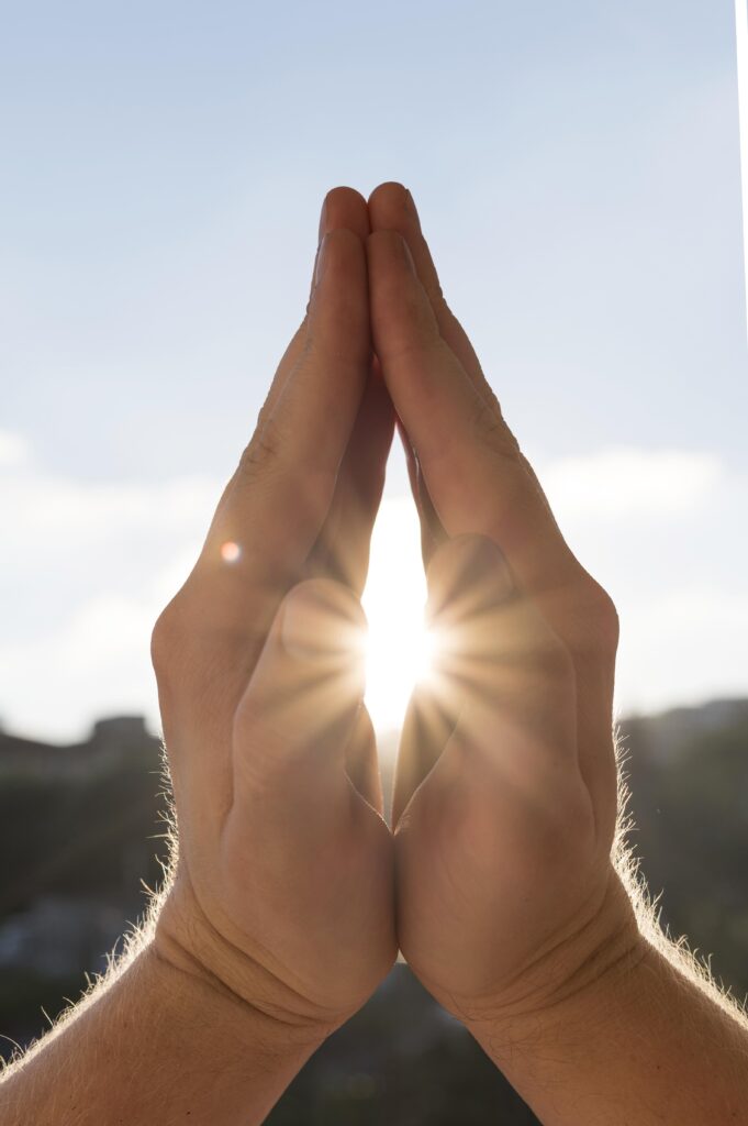 front view hands prayer stance