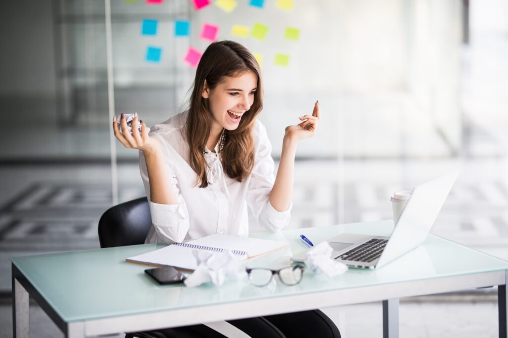 successful businesswoman working laptop computer her office dressed up white clothes 1 1