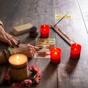 fortune teller reading future by tarot cards rustic table 300x300 1