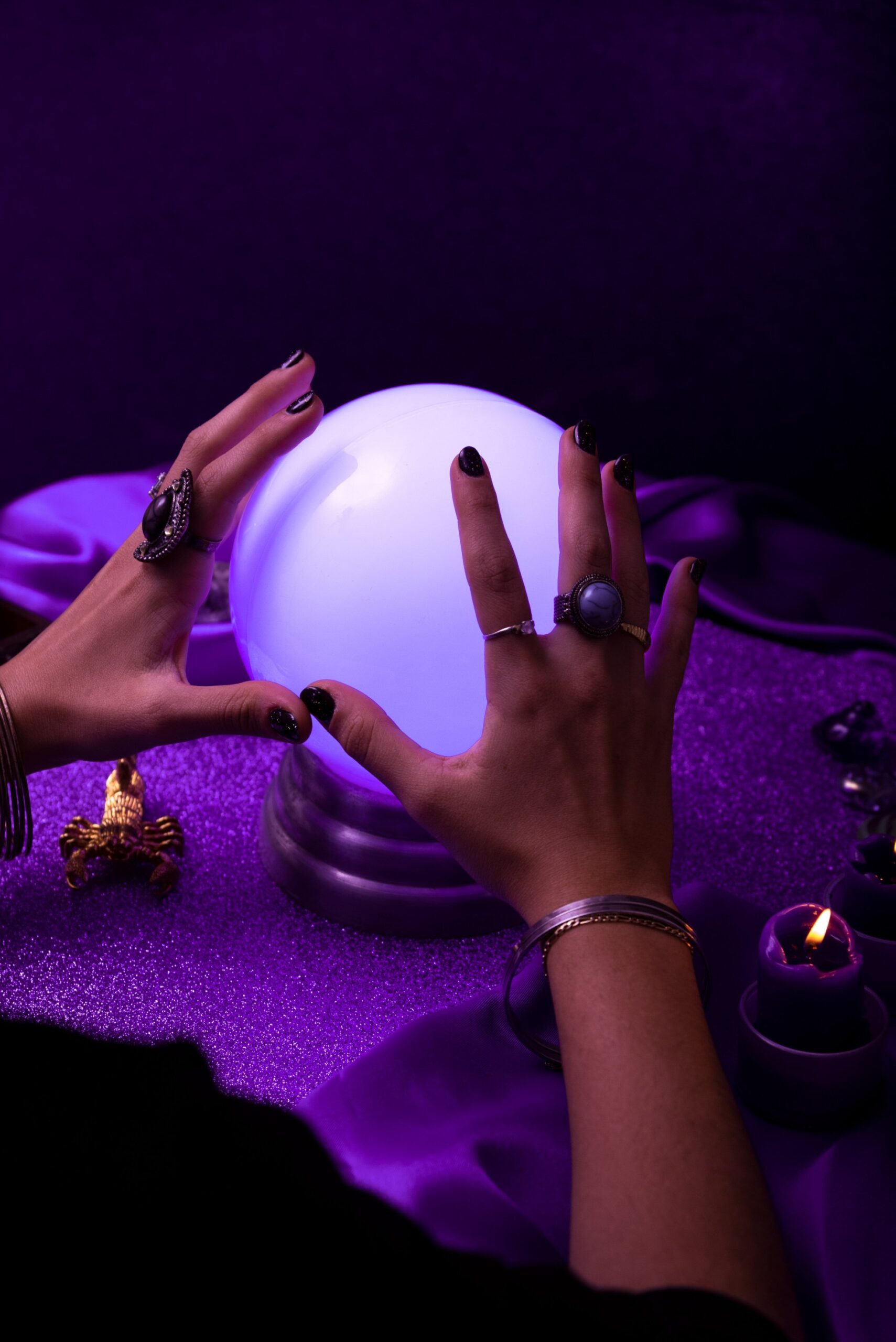 high angle hands holding crystal ball 1 1 scaled