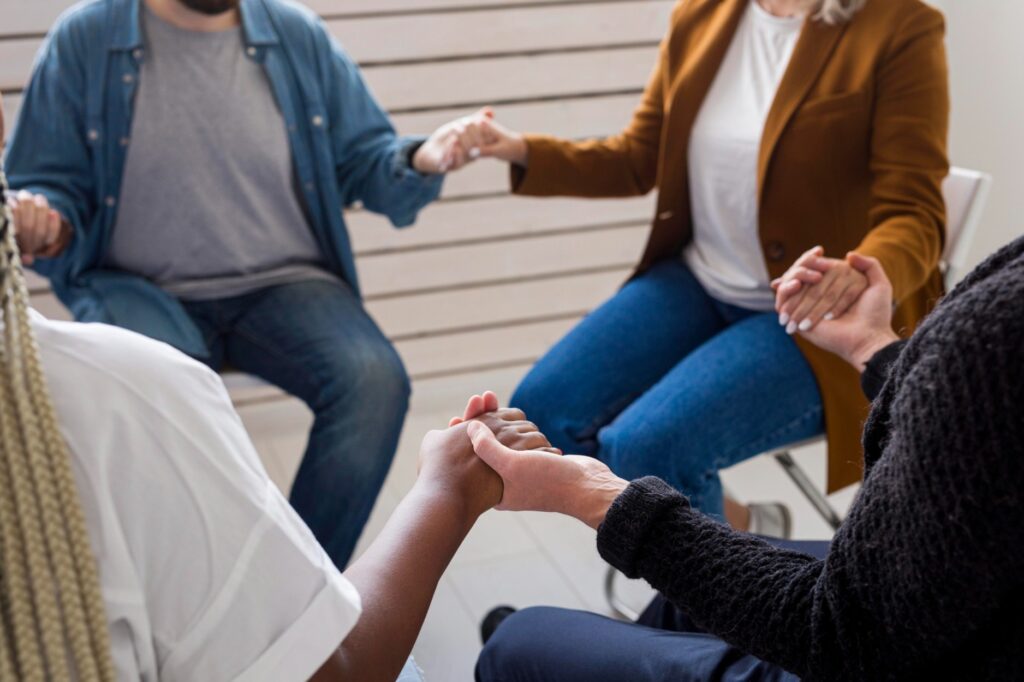 Group Energy Healing Sessions 7 close up community holding hands 1 1 1