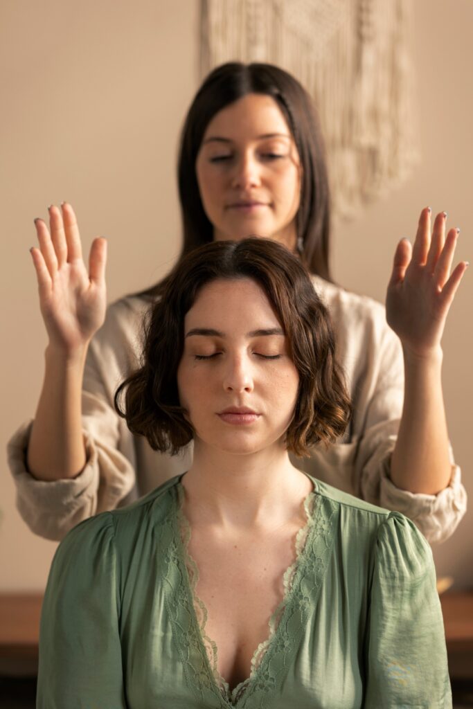 person conducting reiki therapy 2 1 1 1