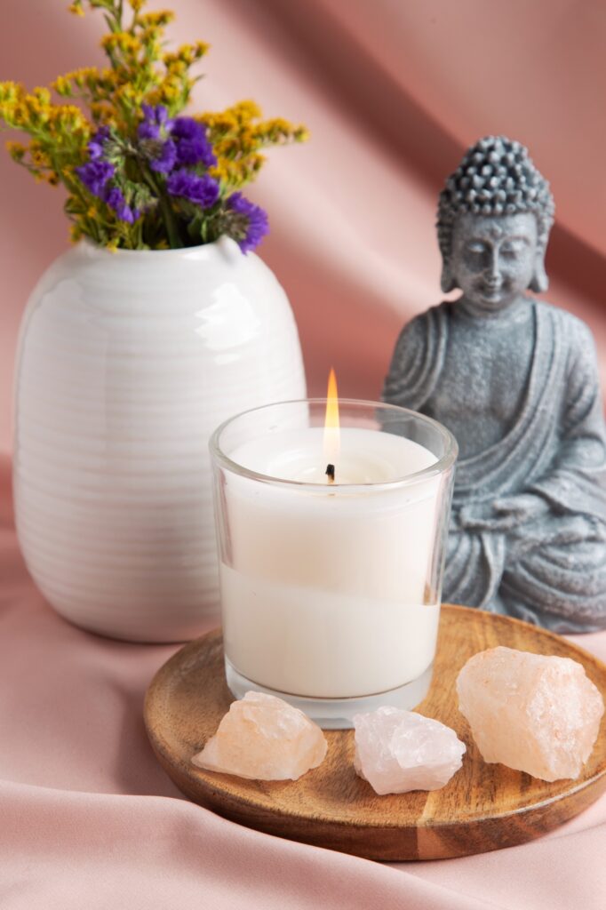 About Us 19 reiki symbols concept with candle statue 1 1 1